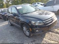 2012 Volkswagen Tiguan — photo 1 of 15 | VIN WVGAV7AX8CW526173