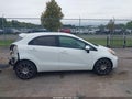 2012 Kia Rio — photo 13 of 16 | VIN KNADM5A34C6088769