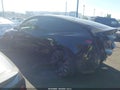 2023 Tesla Model Y — photo 14 of 19 | VIN 7SAYGDEF2PF765924