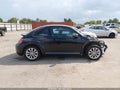 2017 Volkswagen Beetle — photo 13 of 16 | VIN 3VWF17AT9HM628430
