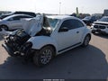 2017 Volkswagen Beetle — photo 2 of 16 | VIN 3VWF17AT0HM607806