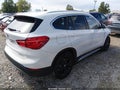 2018 BMW X1 — photo 4 of 19 | VIN WBXHT3C32J5L32546