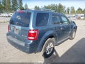2010 Ford Escape Hybrid — photo 4 of 10 | VIN 1FMCU5K32AKB40381
