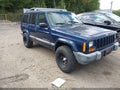 2001 Jeep Cherokee — photo 1 of 11 | VIN 1J4FF48S11L542255