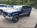 2001 Jeep Cherokee — photo 2 of 11 | VIN 1J4FF48S11L542255