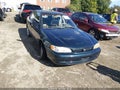 1999 Toyota Corolla — photo 1 of 13 | VIN 2T1BR12E6XC163782
