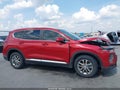 2019 Hyundai Santa Fe — photo 13 of 16 | VIN 5NMS23AD2KH123646