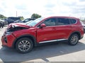 2019 Hyundai Santa Fe — photo 14 of 16 | VIN 5NMS23AD2KH123646