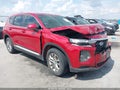 2019 Hyundai Santa Fe — photo 1 of 16 | VIN 5NMS23AD2KH123646