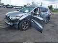 2018 Honda CR-V — photo 2 of 15 | VIN 2HKRW5H36JH402000