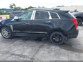 2015 Cadillac SRX — photo 6 of 18 | VIN 3GYFNCE31FS510899