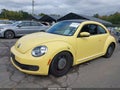 2013 Volkswagen Beetle — photo 2 of 18 | VIN 3VWHP7AT4DM658789
