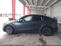 2026 Tesla Model Y — photo 12 of 14 | VIN 7SAYGDED0TA728540