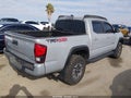 2018 Toyota Tacoma — photo 4 of 16 | VIN 3TMCZ5AN1JM128899