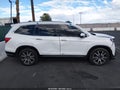 2020 Honda Pilot — photo 13 of 16 | VIN 5FNYF6H00LB016021