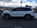 2020 Honda Pilot — photo 14 of 16 | VIN 5FNYF6H00LB016021