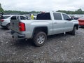2014 GMC Sierra 1500 — photo 4 of 16 | VIN 3GTU2UEH7EG536559