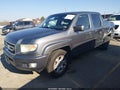 2011 Honda Ridgeline — photo 2 of 16 | VIN 5FPYK1F46BB010251