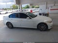 2011 BMW 3 Series — photo 13 of 16 | VIN WBAPH7C57BE683793