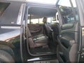 2015 Chevrolet Suburban 1500 — photo 8 of 17 | VIN 1GNSCJKC7FR596068