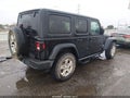 2018 Jeep Wrangler Unlimited — photo 4 of 17 | VIN 1C4HJXDG0JW129841