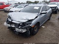 2018 Honda Civic — photo 2 of 17 | VIN 2HGFC2F58JH503161