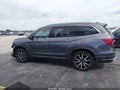 2022 Honda Pilot — photo 14 of 16 | VIN 5FNYF5H93NB006580