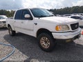 2002 Ford F-150 — photo 1 of 16 | VIN 1FTRW08L32KD88742