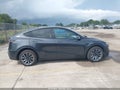 2026 Tesla Model Y — photo 12 of 19 | VIN 7SAYGDED4TA642261