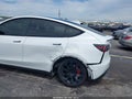 2023 Tesla Model Y — photo 6 of 16 | VIN 7SAYGDEE8PF596502