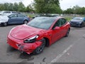 2023 Tesla Model 3 — photo 2 of 14 | VIN 5YJ3E1EA8PF699265
