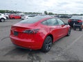 2023 Tesla Model 3 — photo 4 of 14 | VIN 5YJ3E1EA8PF699265