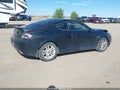 2008 Hyundai Tiburon — photo 4 of 17 | VIN KMHHM66D98U264578