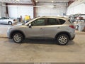 2014 Mazda CX-5 — photo 14 of 17 | VIN JM3KE4CY5E0323851