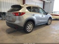 2014 Mazda CX-5 — photo 4 of 17 | VIN JM3KE4CY5E0323851