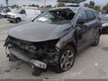2018 Honda CR-V — photo 2 of 17 | VIN 2HKRW1H8XJH509605