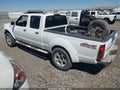2002 Nissan Frontier — photo 3 of 12 | VIN 1N6MD29Y52C367730
