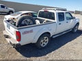 2002 Nissan Frontier — photo 4 of 12 | VIN 1N6MD29Y52C367730