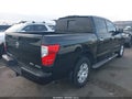 2018 Nissan Titan — photo 4 of 17 | VIN 1N6AA1E59JN548902