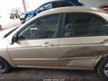 2009 Kia Spectra — photo 14 of 16 | VIN KNAFE221195646108