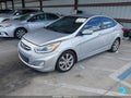 2014 Hyundai Accent — photo 2 of 16 | VIN KMHCU4AE8EU620030