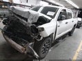 2016 Toyota Tundra — photo 2 of 16 | VIN 5TFDW5F13GX544698