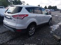 2013 Ford Escape — photo 4 of 16 | VIN 1FMCU9H92DUC95492