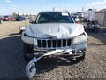 2011 Jeep Grand Cherokee — photo 12 of 16 | VIN 1J4RR4GG0BC584614