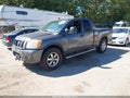2010 Nissan Titan — photo 2 of 15 | VIN 1N6AA0CC4AN310418