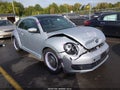 2013 Volkswagen Beetle — photo 1 of 17 | VIN 3VWJP7ATXDM606603