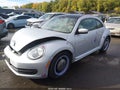2013 Volkswagen Beetle — photo 2 of 17 | VIN 3VWJP7ATXDM606603
