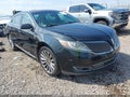 2015 Lincoln MKS — photo 1 of 19 | VIN 1LNHL9DK7FG605221