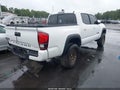 2023 Toyota Tacoma — photo 4 of 19 | VIN 3TMCZ5AN5PM615211