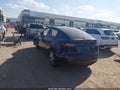 2023 Tesla Model Y — photo 3 of 14 | VIN 7SAYGDEE1PA148745